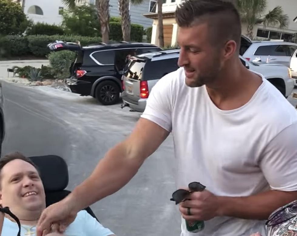 Tim Tebow Gives Man in Wheelchair His Own Cross and Chain [VIDEO]