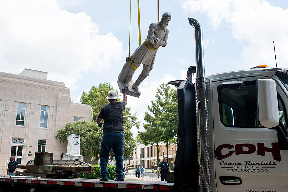 Photos + Videos of Mouton Statue Removal