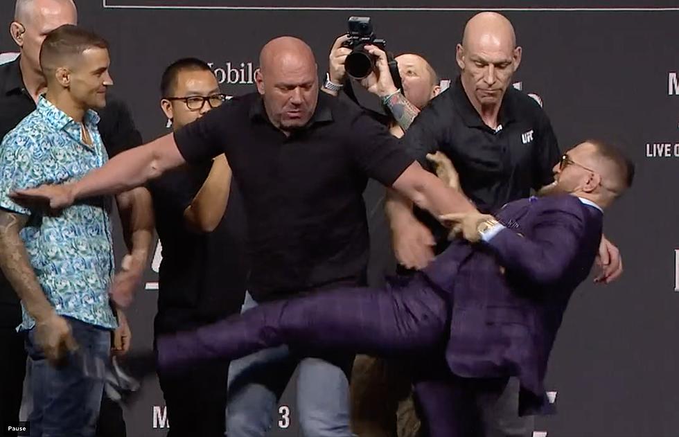 Conor McGregor Tries to Kick Dustin Poirier During Face-off