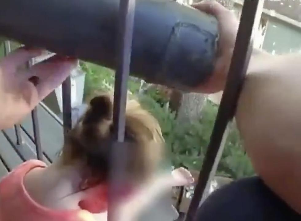 Police Use Battering Ram to Free Kid's Head From Railing [VIDEO]