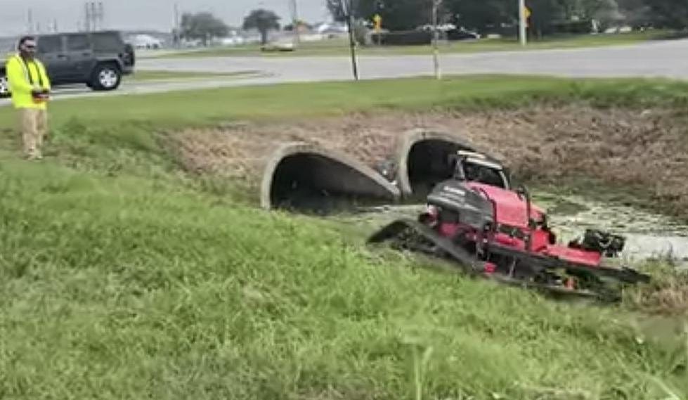 Youngsville Using Remote Control Lawnmower for Maintenance 