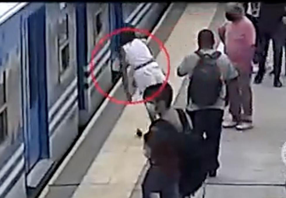 Woman Faints and Falls Under Moving Train, Survives Terrible Scene [VIDEO]