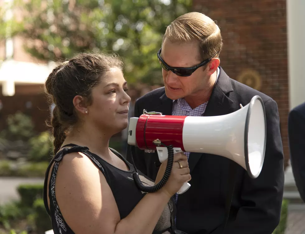 Here&#8217;s The Story Behind This Powerful Viral Photo From a Reproductive Rights March in Lafayette