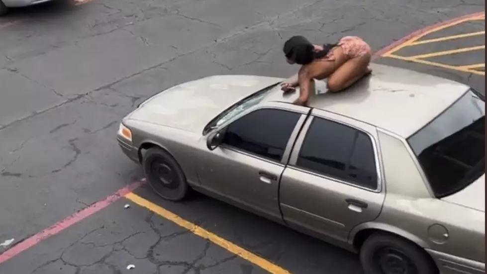 Absurd Video Shows Woman Getting Her Arm Crushed in Car Door as She Rides on Top