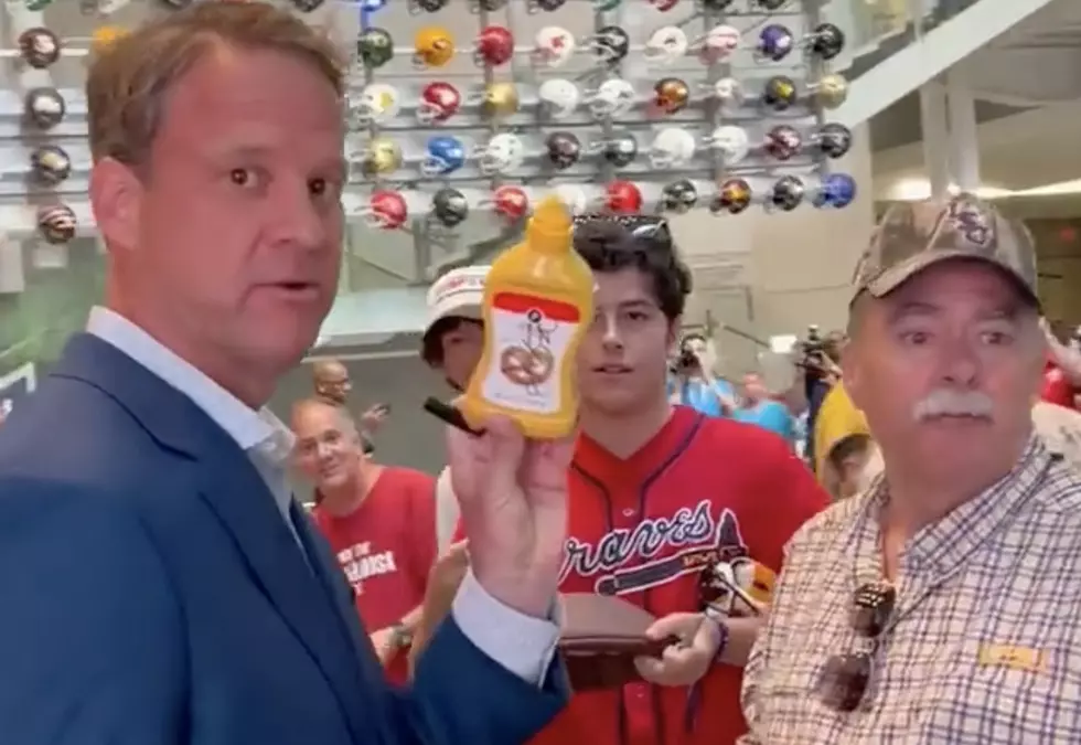 Ole Miss Coach Lane Kiffin Signs Bottle of Mustard for LSU Fan [VIDEO]