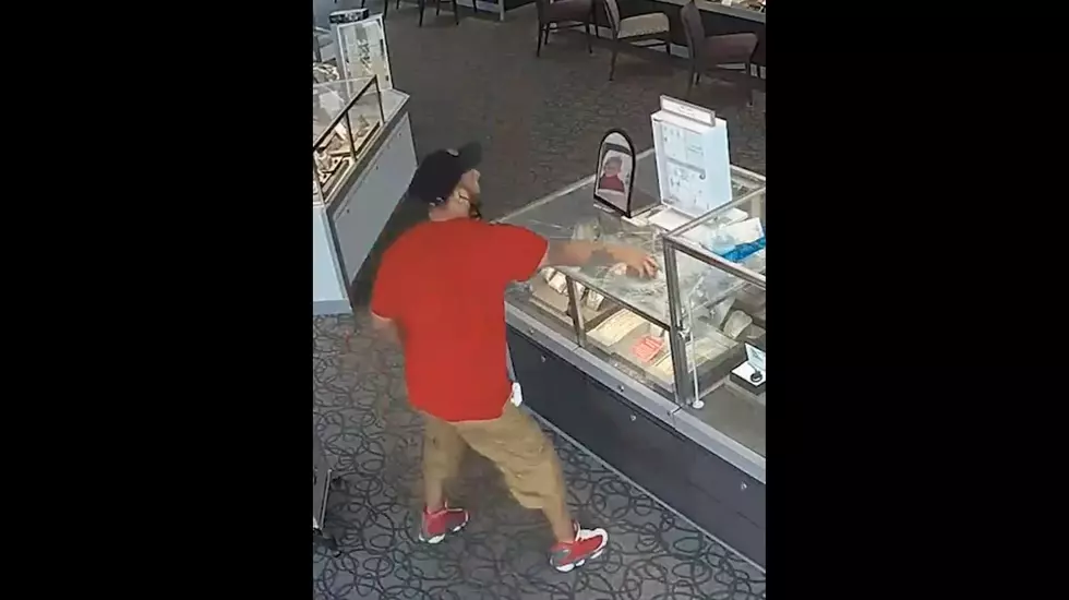 Man Attempts to Break Jewelry Case Glass with Brick, Fails Miserably