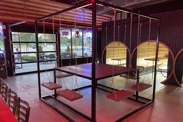 New Bar in Lafayette Creates Buzz With Swings Around Tables