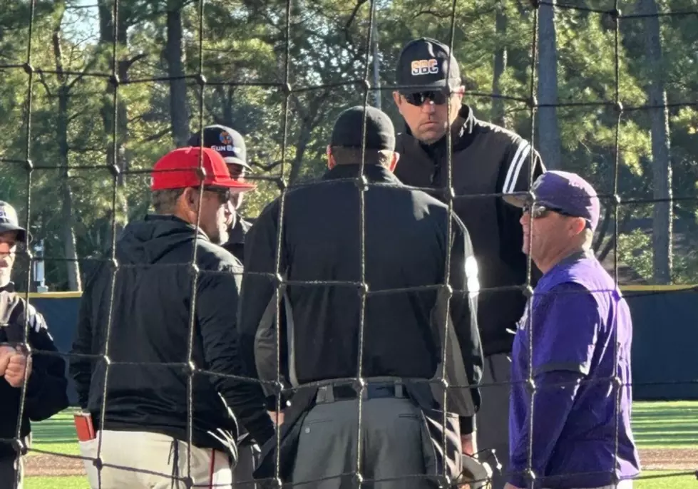 Photo Shows Umpire in Lafayette Towering Over Coaches [PHOTOS]