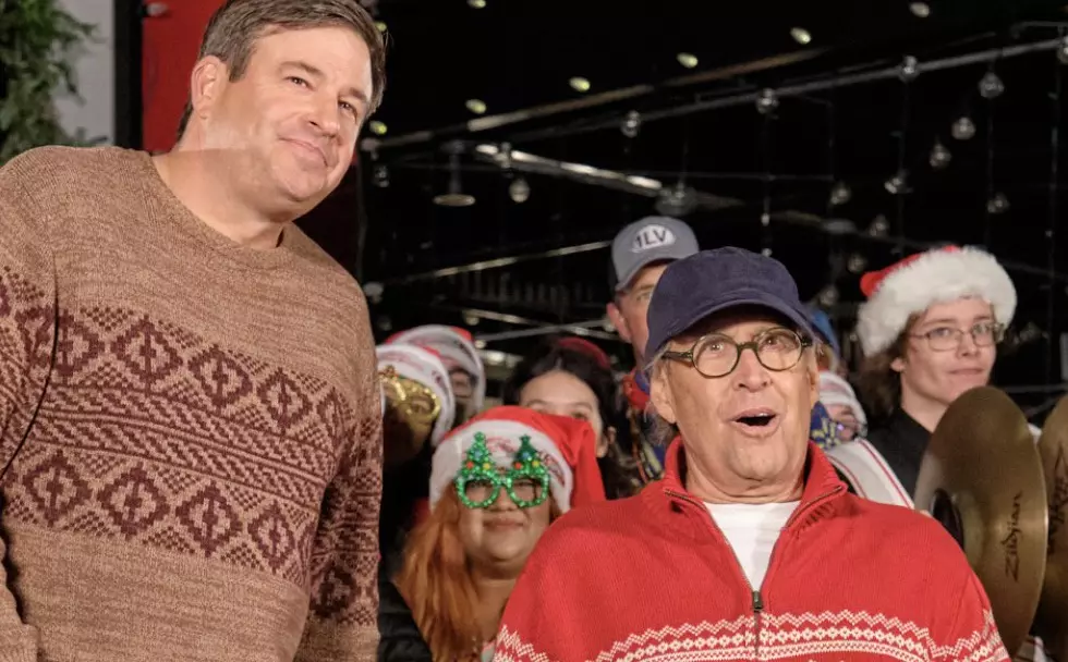 Chevy Chase Helps Light Up Raising Cane’s Restaurant for Christmas [PHOTOS]