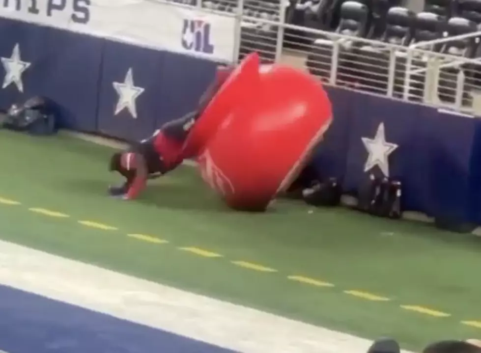 High School Football Player Gets Stuck in Salvation Army Kettle in Dallas, Tx [VIDEO]