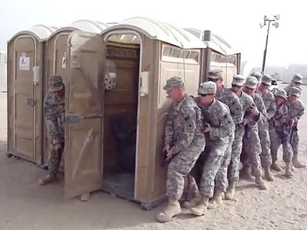 Military Police Valiantly Secure a Porta-Potty [VIDEO]