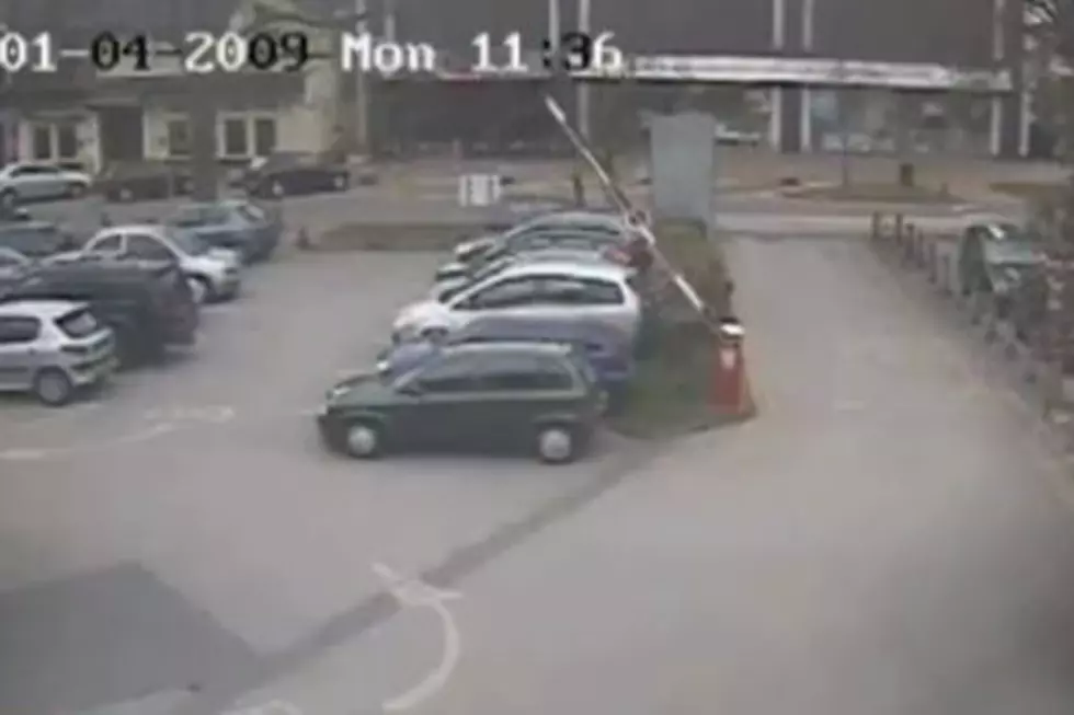 Barrier Gate Takes Out Anger on Car