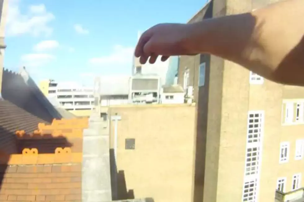Brave Man Demonstrates Rooftop Parkour Skills