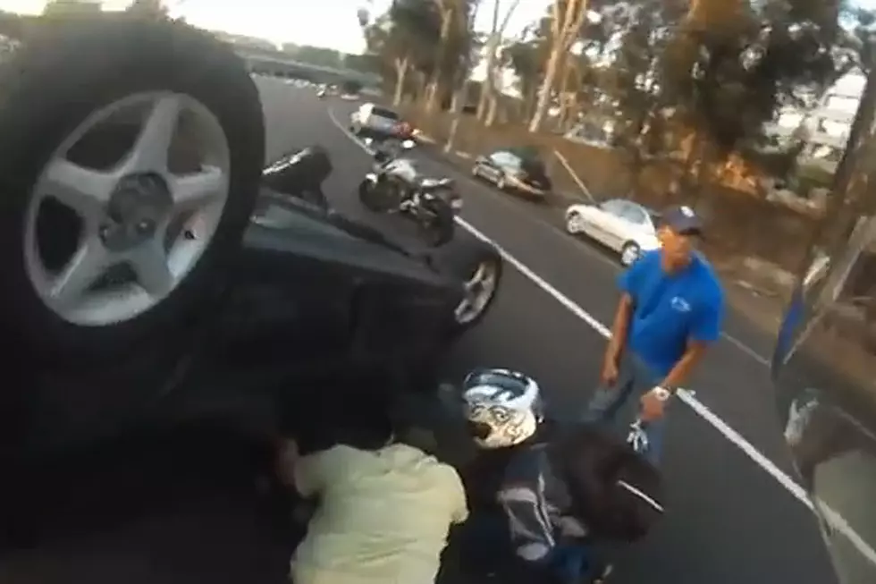 Heroic Motorcyclist Saves Driver Trapped in Overturned Car