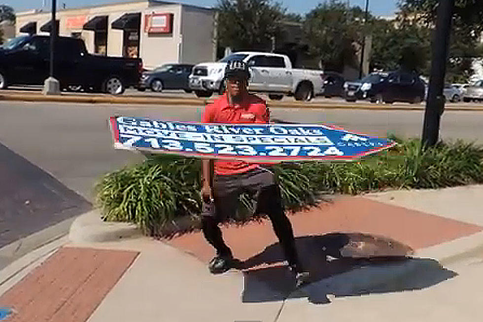 Expert Sign Spinner Is the Ad Man of the Future