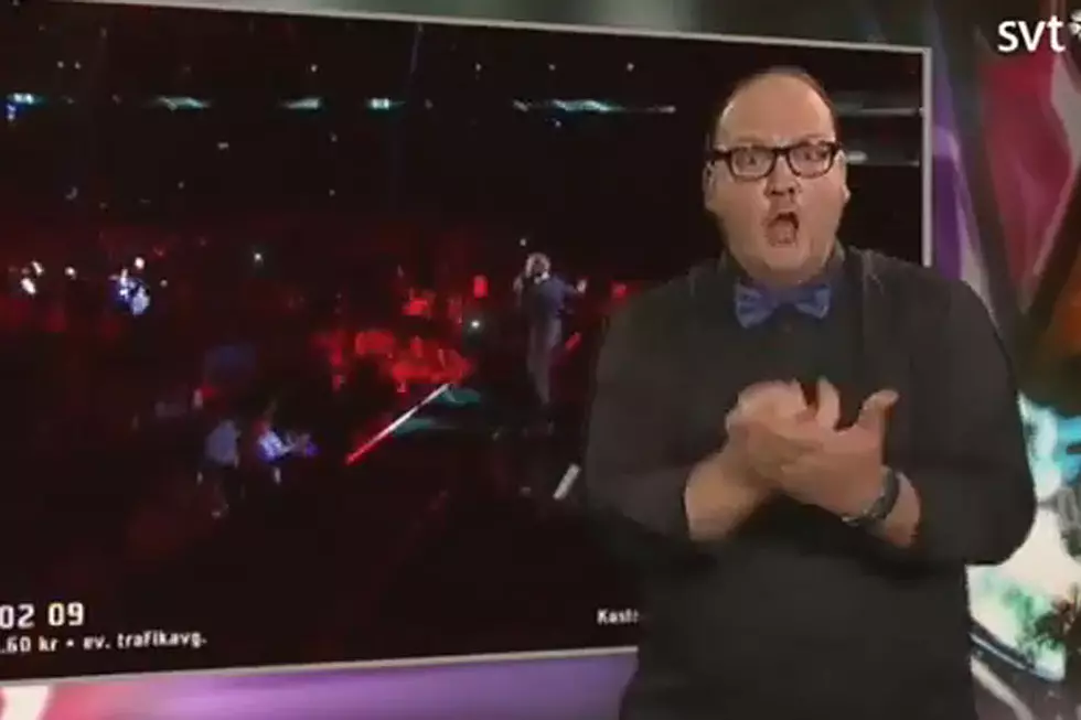 Pumped-Up Sign Language Interpreter Rocks Out to Hit Song