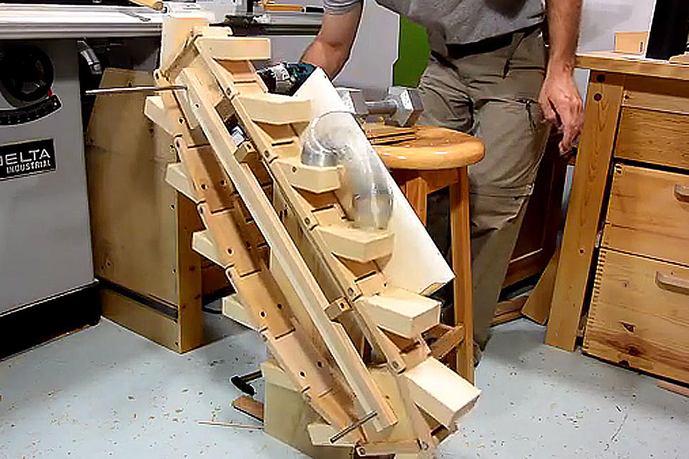 Man With No Intention of Growing Up Builds Awesome Slinky Elevator (VIDEO)