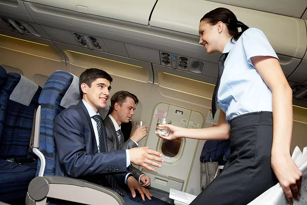 Flight Attendant Dances With Passenger in Ultimate Customer Service