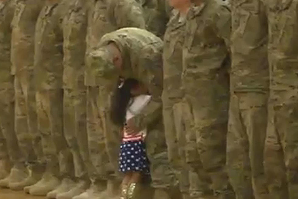Girl Interrupts Ceremony to Hug Soldier Dad Returning Home