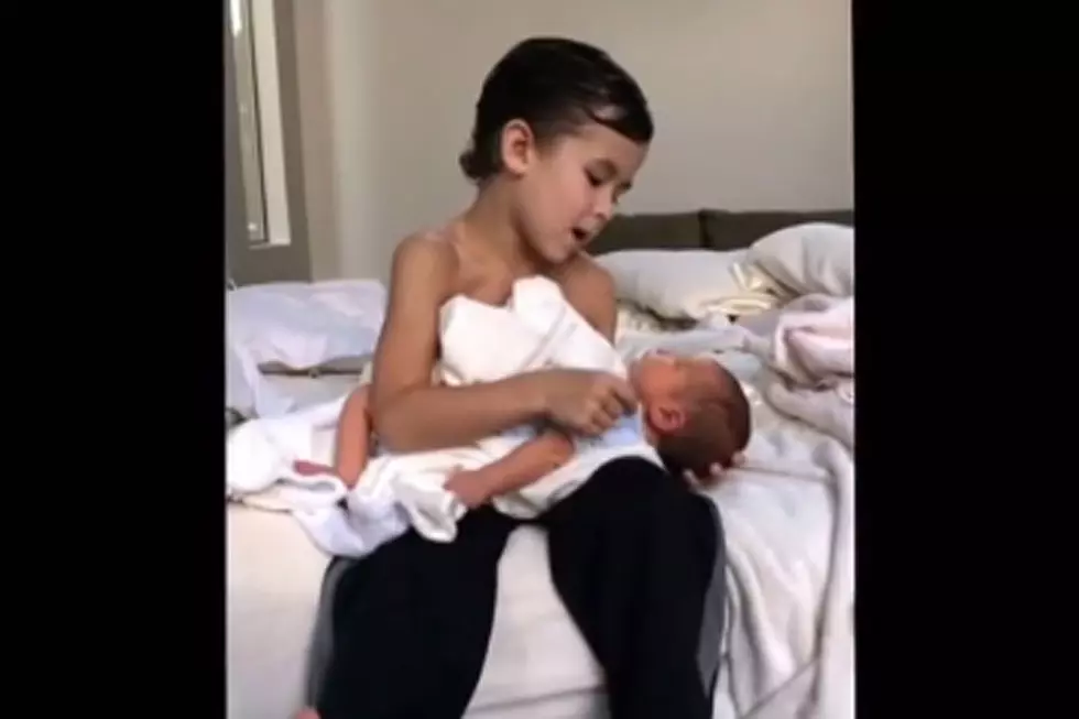 Boy Sings Ooey Gooey Sweet Lullaby to New Baby Brother