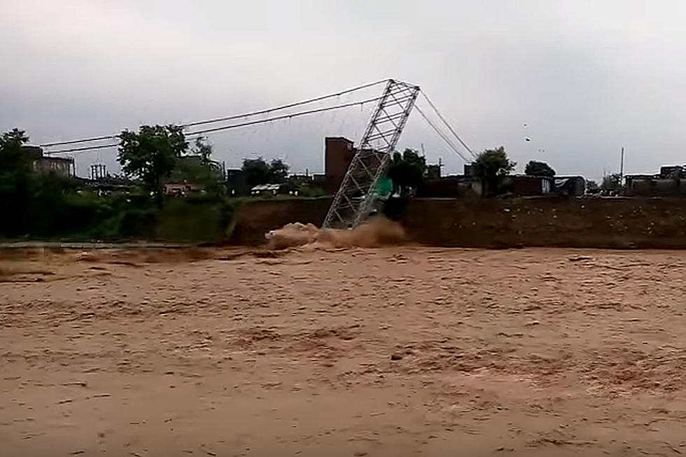 Suspension Bridge Collapses During Wicked Flooding