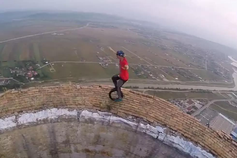 Unicyclist on 800-Foot-High Ledge Is (Literally) Living on the Edge
