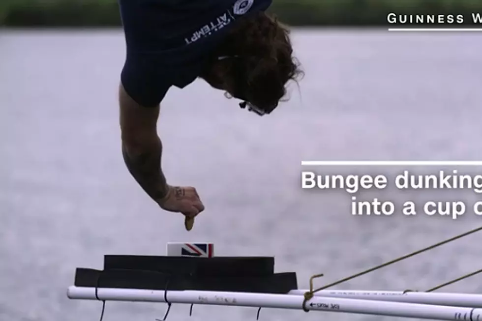 Watch the 240-Foot, Bungee-Jumping, Tea-Dunking Record-Setter