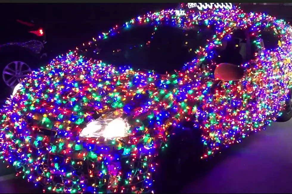 Christmas-Loving Cabbie Drives Taxi Adorned With 9,000 Lights