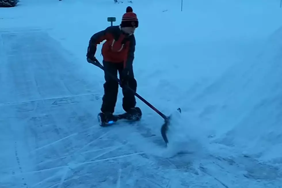 Definite Child Genius Hoverboards While Shoveling Snow