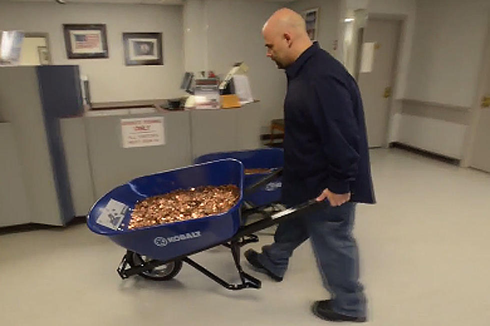 Peeved Man Pays DMV Bill With 300,000 Pennies