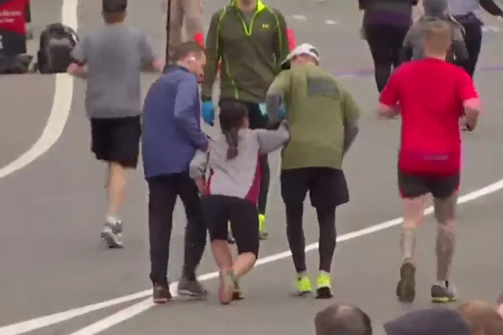 Runners Carry Woman on Brink of Collapsing to Finish Line