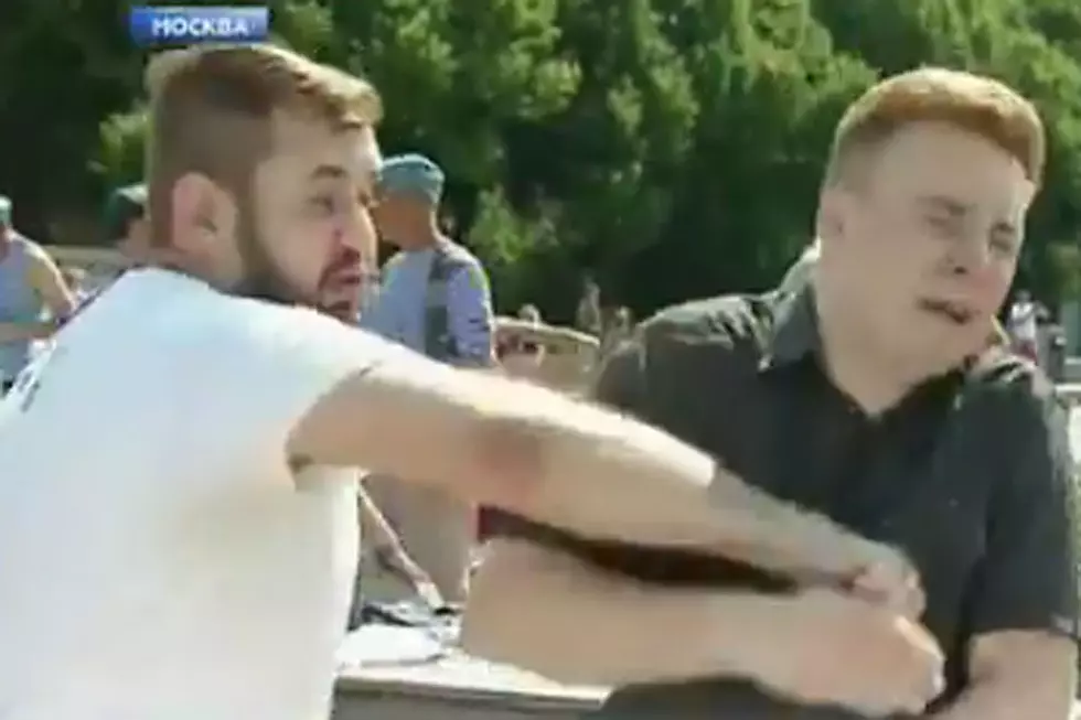 Drunk Russian Soldier Levels Vicious Punch on Reporter