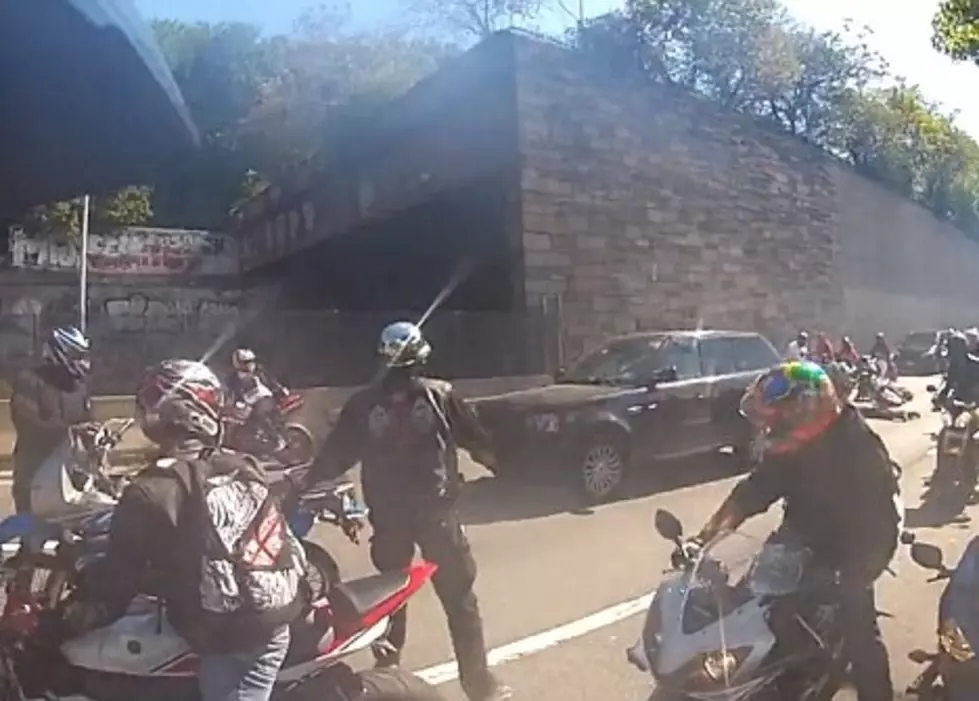 SUV Runs Over Motorcyclists [Video]