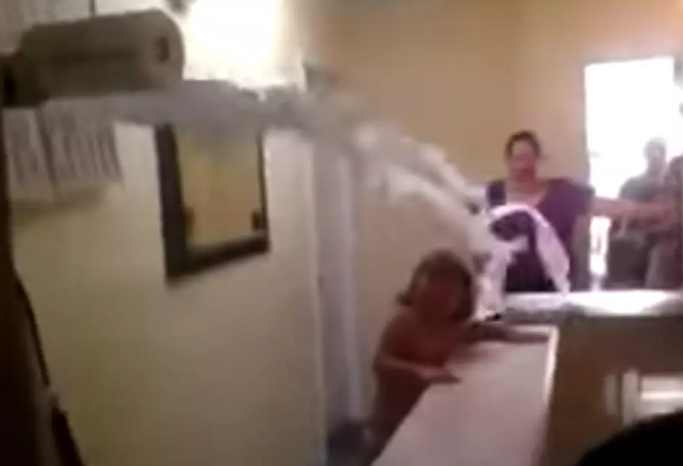 Dad & Son Awesomely Ambush Mom With Toilet Paper Gun [Video]