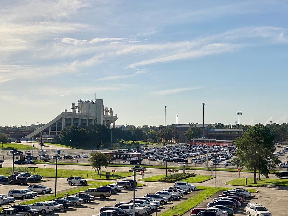 Hundreds Of Cars Line Up For Food Distribution At Cajun Field