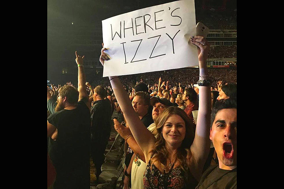 Guns N’ Roses Fan Claims ‘Where’s Izzy’ Sign Destroyed By Security, Band Denies Involvement