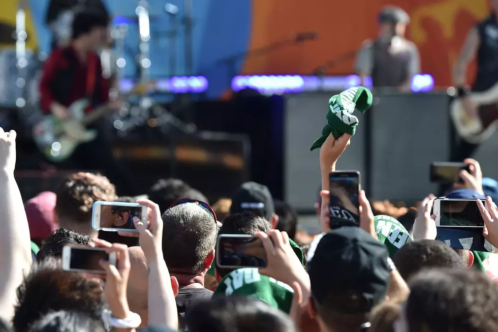 Cell Phones at Concerts: To Ban or Not to Ban?