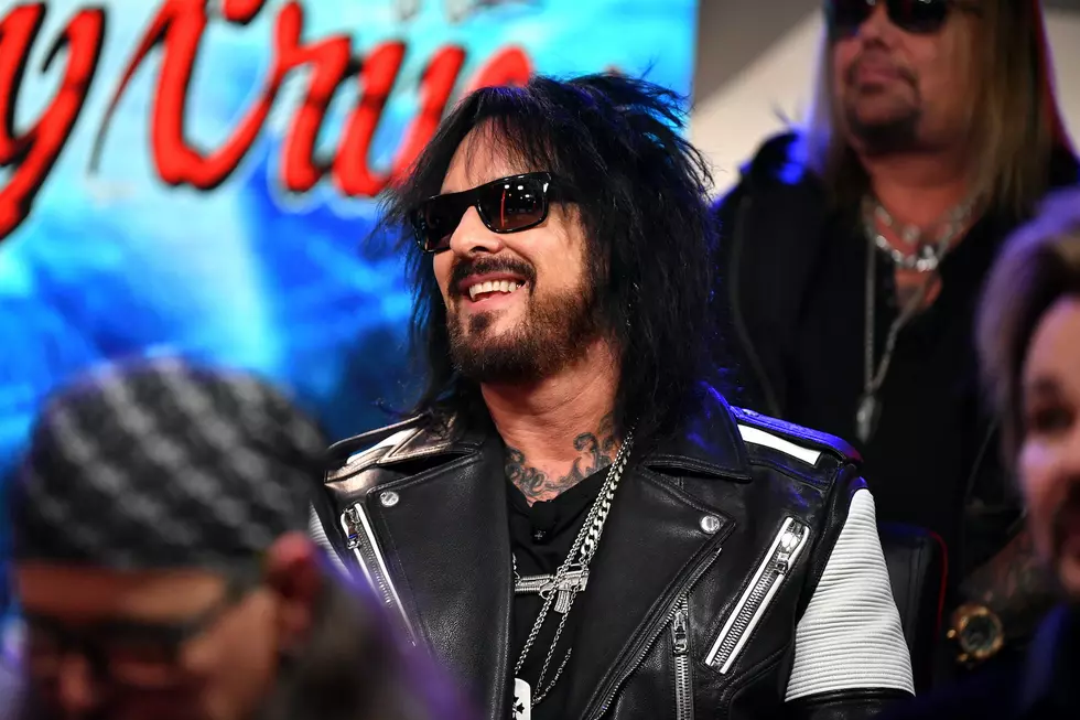 Motley Crue's Nikki Sixx Holds Baby Daughter Ruby in New Photos