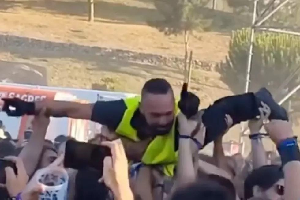 Watch Security Guard Crowd Surf at Metal Festival