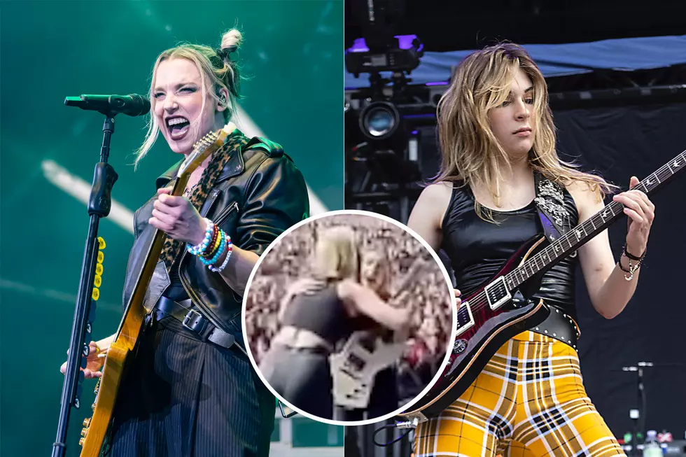 Halestorm's Lzzy Hale Gifts The Warning Singer Guitar Onstage