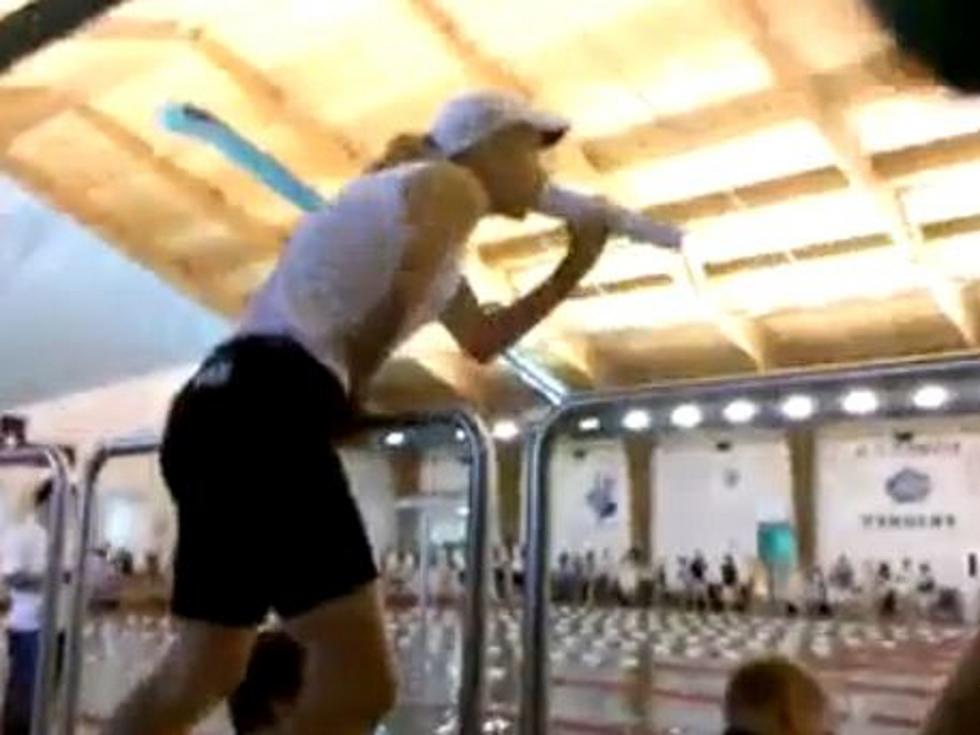 Mom Goes Overboard Cheering on Daughter at Swim Meet [VIDEO]