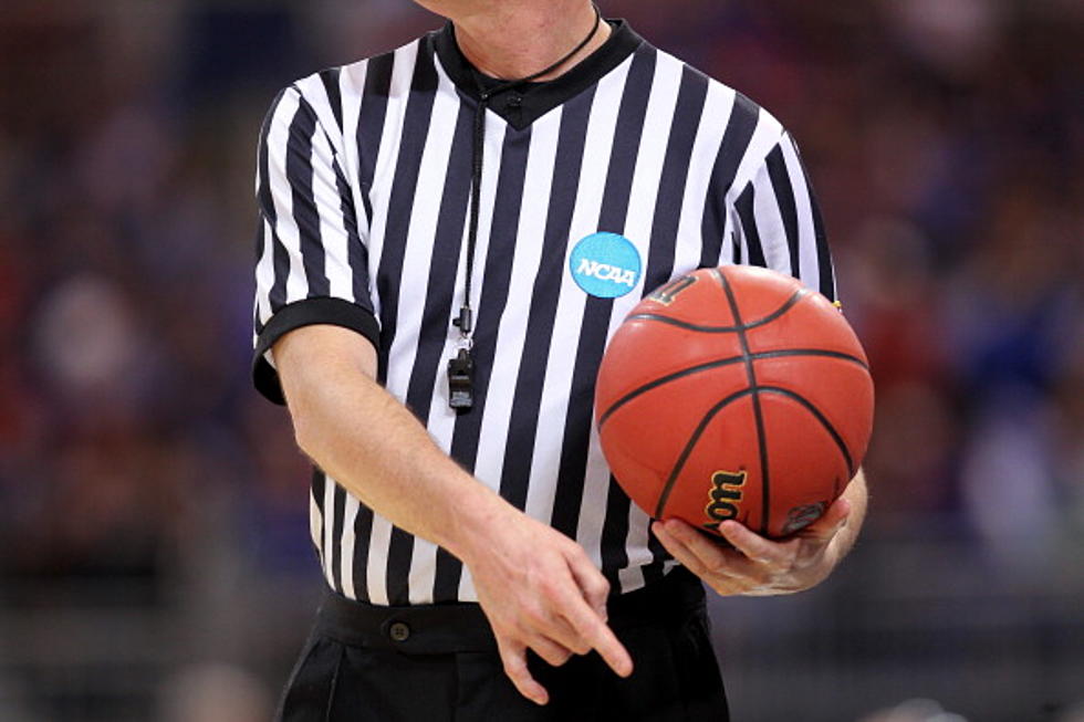 Basketball Referee Talks On Phone While Working Game - VIDEO