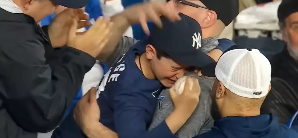 Blue Jays Fan Act of Kindness Brings Young Yankees Fan to Tears