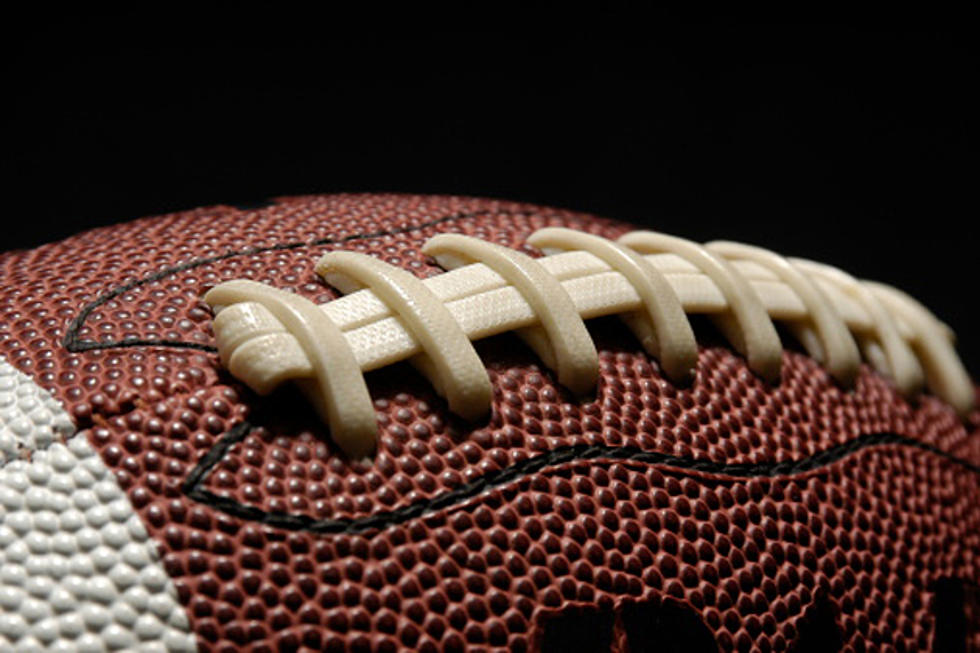Woman Arrested For Trying To Toss Drug-Filled Footballs Into Prison