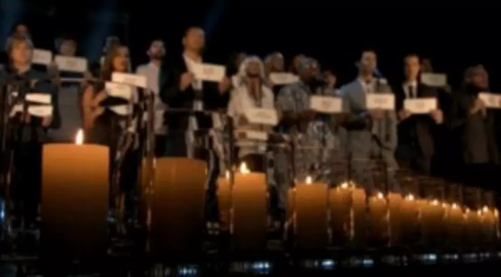 Contestants, hosts and judges sing Hallalejah in honor of the Newtown, CT shooting victims.