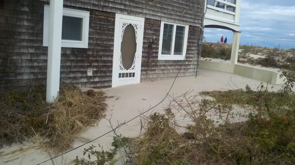 US makes 1st new payments to Sandy victims after review