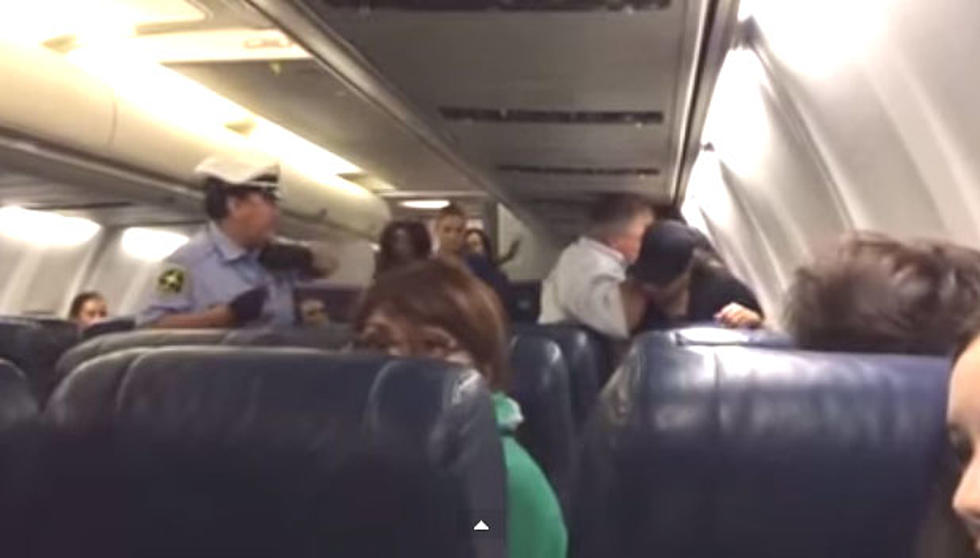 Screaming woman removed from plane at Philly Airport