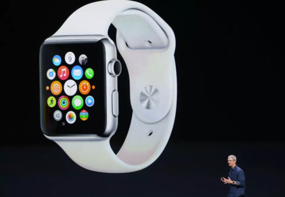 Apple unveils smartwatch and new, larger iPhones