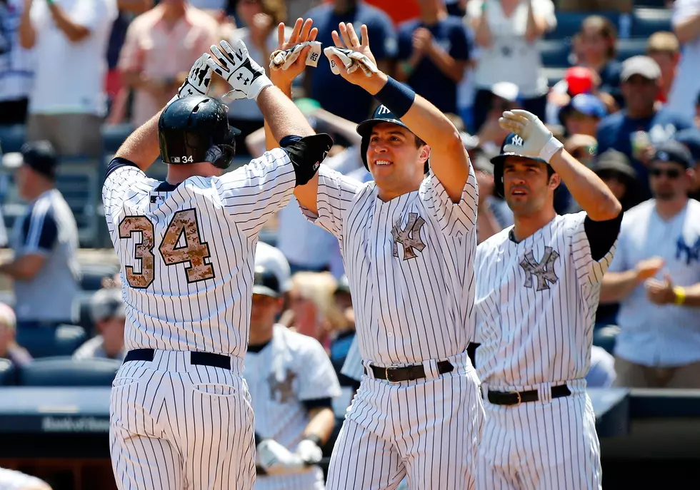 Yankees snap skid with 14-1 rout of Royals