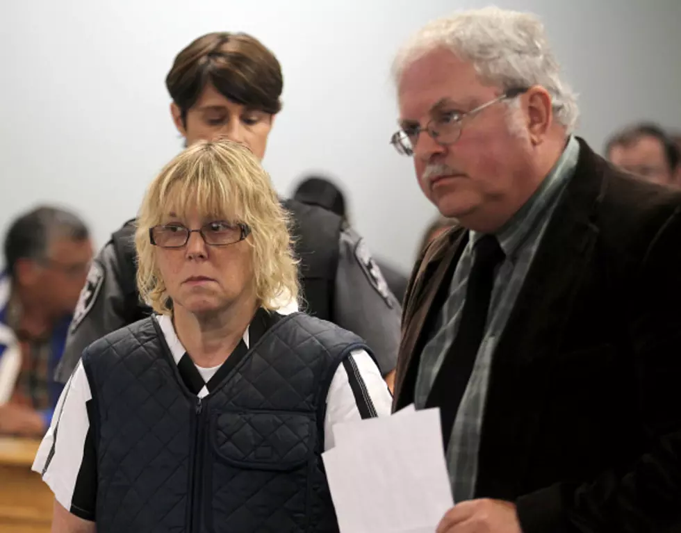 Prison worker charged with aiding escapees appears in court